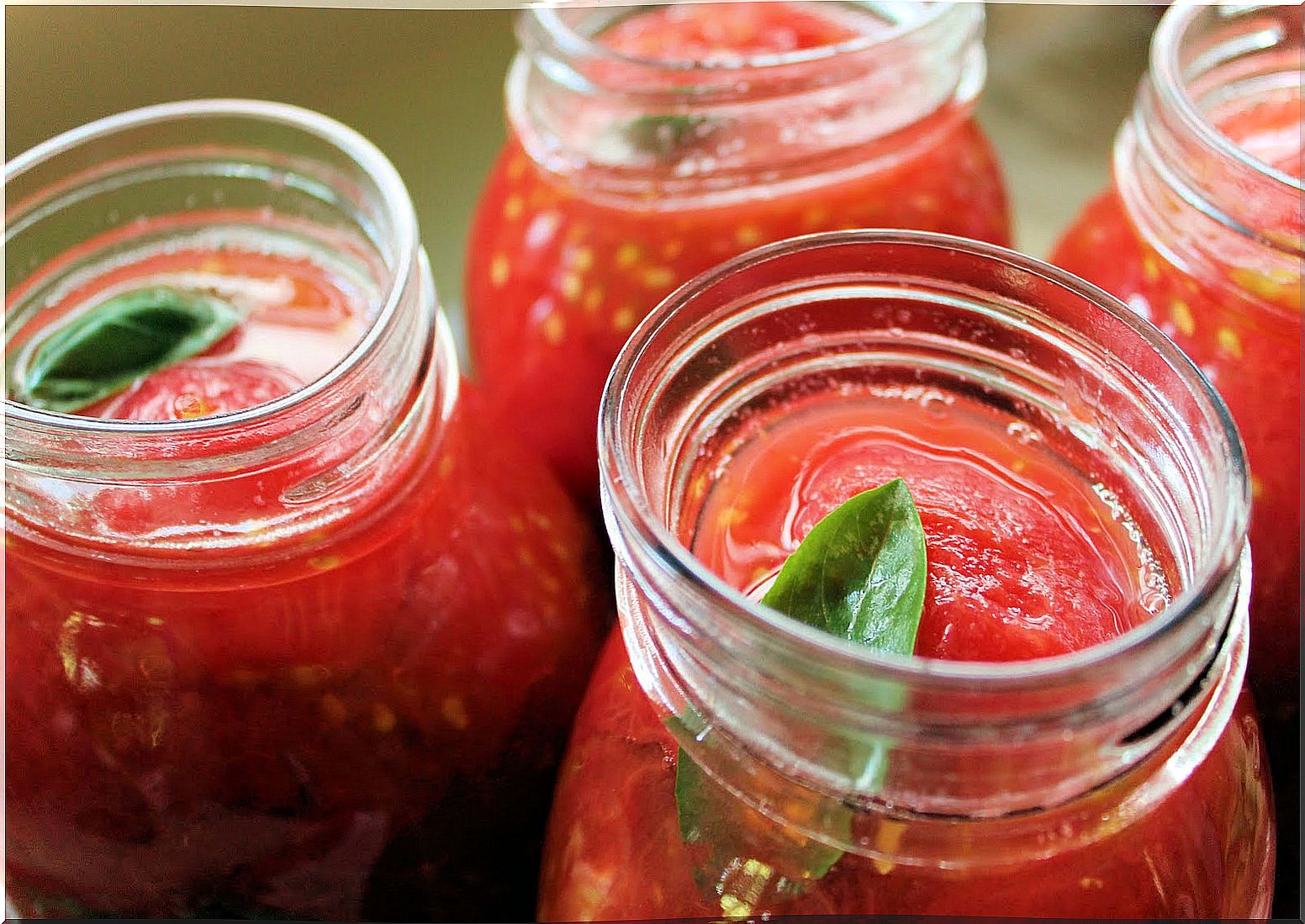 Bottled fresh red tomatoes