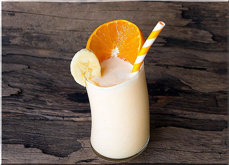 Smoothie with a slice of orange and banana