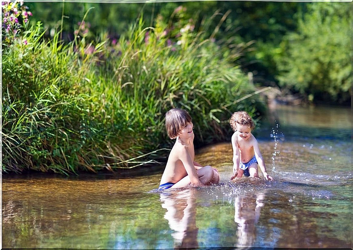 Children swim in the lagoon and get swimmer's itch.