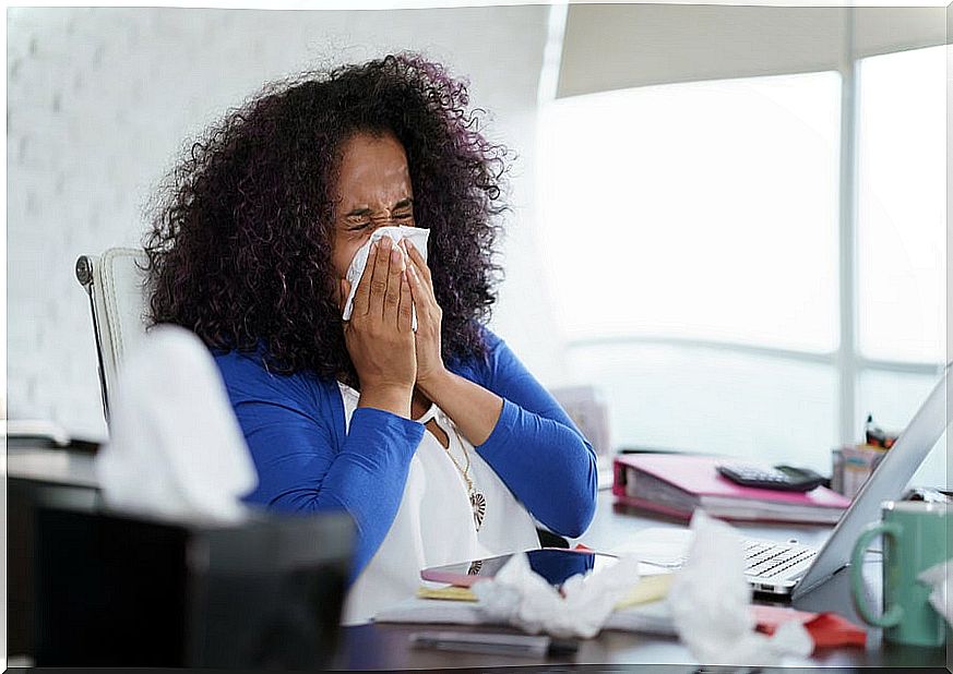 Woman with a runny nose